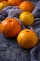 Sweet orange tangerines on concrete background