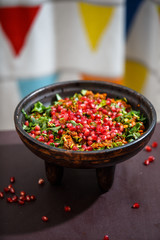 Kuchmachi - traditional Georgian dish of offal with grains of pomegranate