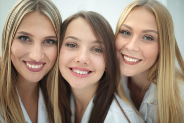 Beautiful female doctors are making selfie  and smiling