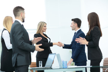 Business people shaking hands, finishing up a meeting