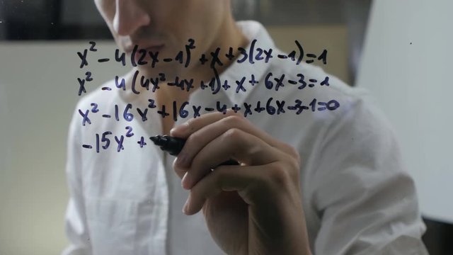 Scientist man writting formulas