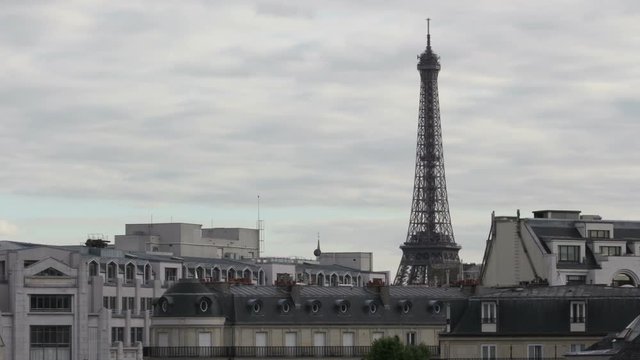 Eiffel Tower time lapse on a warm summers evening. Filmed from the rooftops of Paris