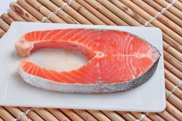 Ready raw fresh salmon for cooking or served.