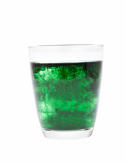 chlorophyll in glass isolated on white background