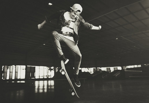 Boy Skateboarding Jump Lifestyle Hipster Concept