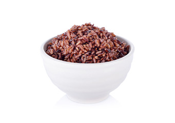 cooked red rice in white bowl on white background