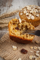 Fresh muffins with oatmeal baked with wholemeal flour and ears of rye grain, delicious healthy dessert