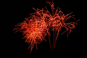 Fireworks in the night.New Year celebration fireworks,Colorful fireworks over dark sky, displayed during a celebration event