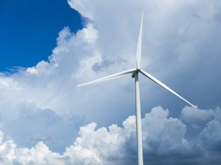 Wind turbine , cloudy background
