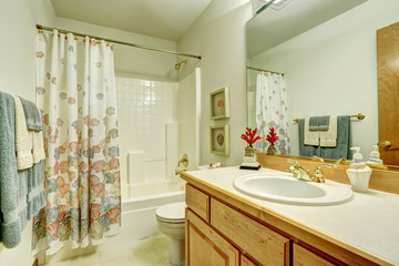 Bathroom in marine style. Shower curtain with sea shells pattern