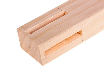 Close-up of a board with a woodworking mortises isolated