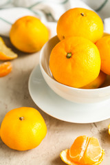fresh tangerines on table