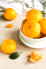 fresh tangerines on table