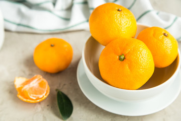 fresh tangerines on table