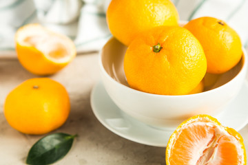 fresh tangerines on table