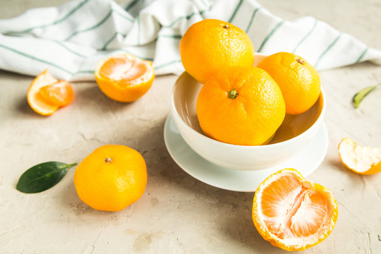 fresh tangerines on table