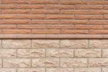 Brick wall made of two types of bricks.