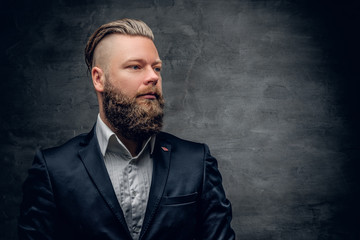 Bearded hipster male in purple suit.