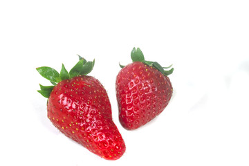 two berries ripe strawberry torn home