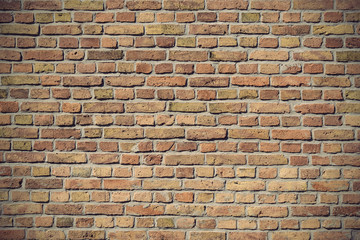 Naklejka premium old red brick wall background texture, vintage filtered style