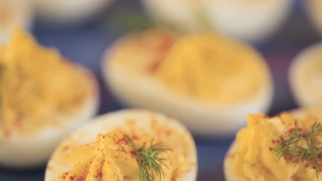 Deviled eggs garnished with fresh dill