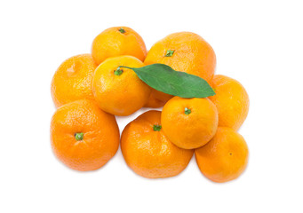 Pile of mandarin oranges on a light background