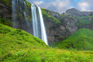 Rainbow decorates drop of water