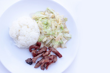 Fried cabbage with Shell oil on white dish and Fried Pork in white plate isolated on white backgeound, Thai food style