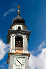 Bell tower of the Evangelical Reformed Church in Samedan. Engadine, Switzerland 