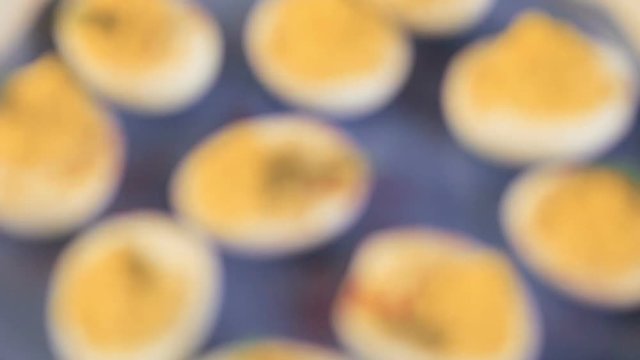 Deviled eggs garnished with fresh dill