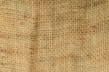 Natural linen striped uncolored textured sacking burlap background