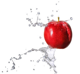 Fototapeta na wymiar Water splash and fruits isolated on white backgroud with clipping path. Fresh apple