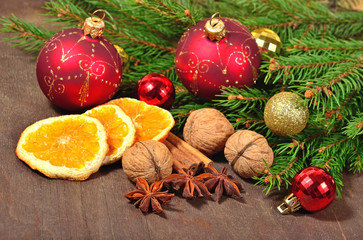 Different kinds of spices, nuts and dried oranges, Christmas dec