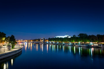 Fototapeta na wymiar Seine river and view on the Grand Palais on the sunrise, Paris, France
