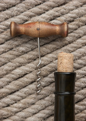 Old corkscrew and bottle