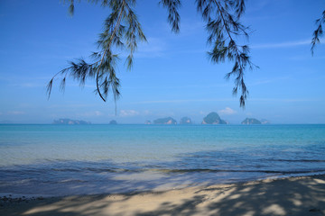 Beautiful white sand and blue sea of Thailand with many islands, view from Tub Kaek beach, Krabi