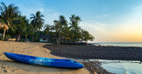 Obraz na płótnie Canvas Kayak on the shore of a tropical beach on the island