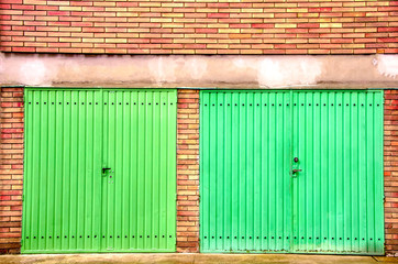 red brick garage green door