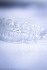 Invisible teeth aligners