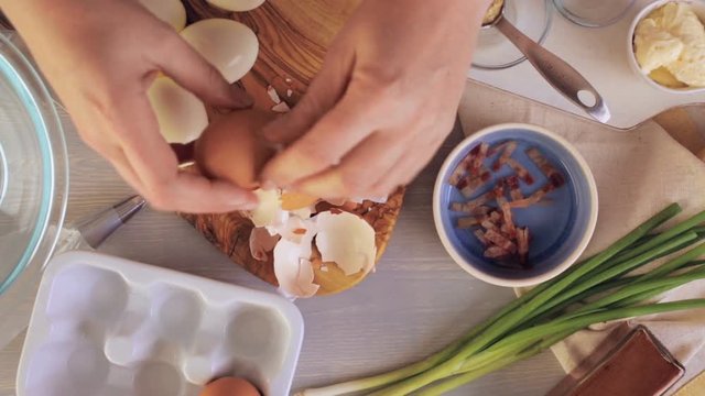 Preparing deviled eggs with organic eggs for appetizer. Step by step recipe