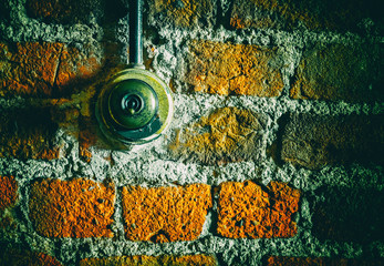 Vintage toggle light switch on brick wall