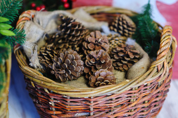 pine cones in a basket. Christmas Decor