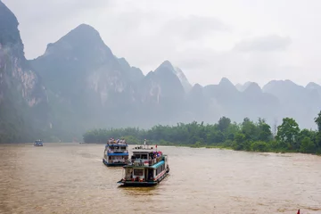 Rolgordijnen Boat cruise on Li river, Guangxi Zhuang, China © dinozzaver