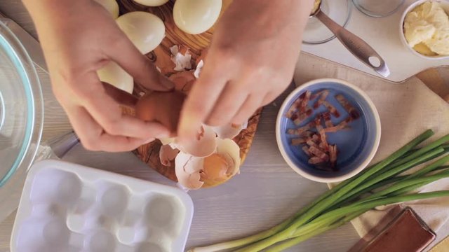 Preparing deviled eggs with organic eggs for appetizer. Step by step recipe
