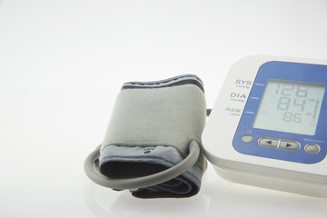 Digital Blood Pressure Monitor on white background