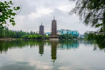 Afwasbaar fotobehang Two pagodas of Sun and Moon, Guilin, China © dinozzaver