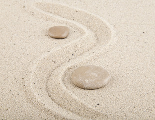 Fototapeta na wymiar background with stones and sand for meditation and relaxation to
