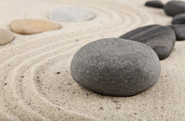 Fototapeta na wymiar background with stones and sand for meditation and relaxation to
