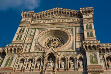 Fototapeta premium Facade of famous religious and art monument - Duomo Santa Maria Del Fiore and Campanile. Florence, Italy