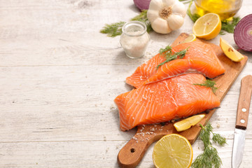 raw salmon fillet with ingredients